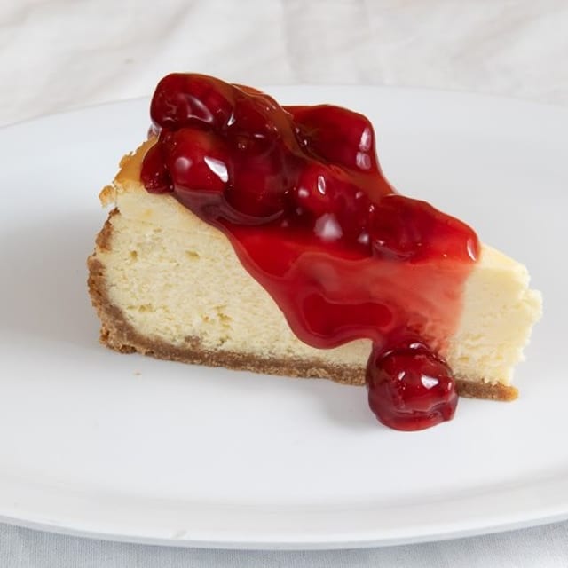 Cheesecake Topped with Cherries.